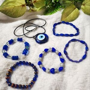 Handmade beaded bracelets and evil eye wire wrapped pendant